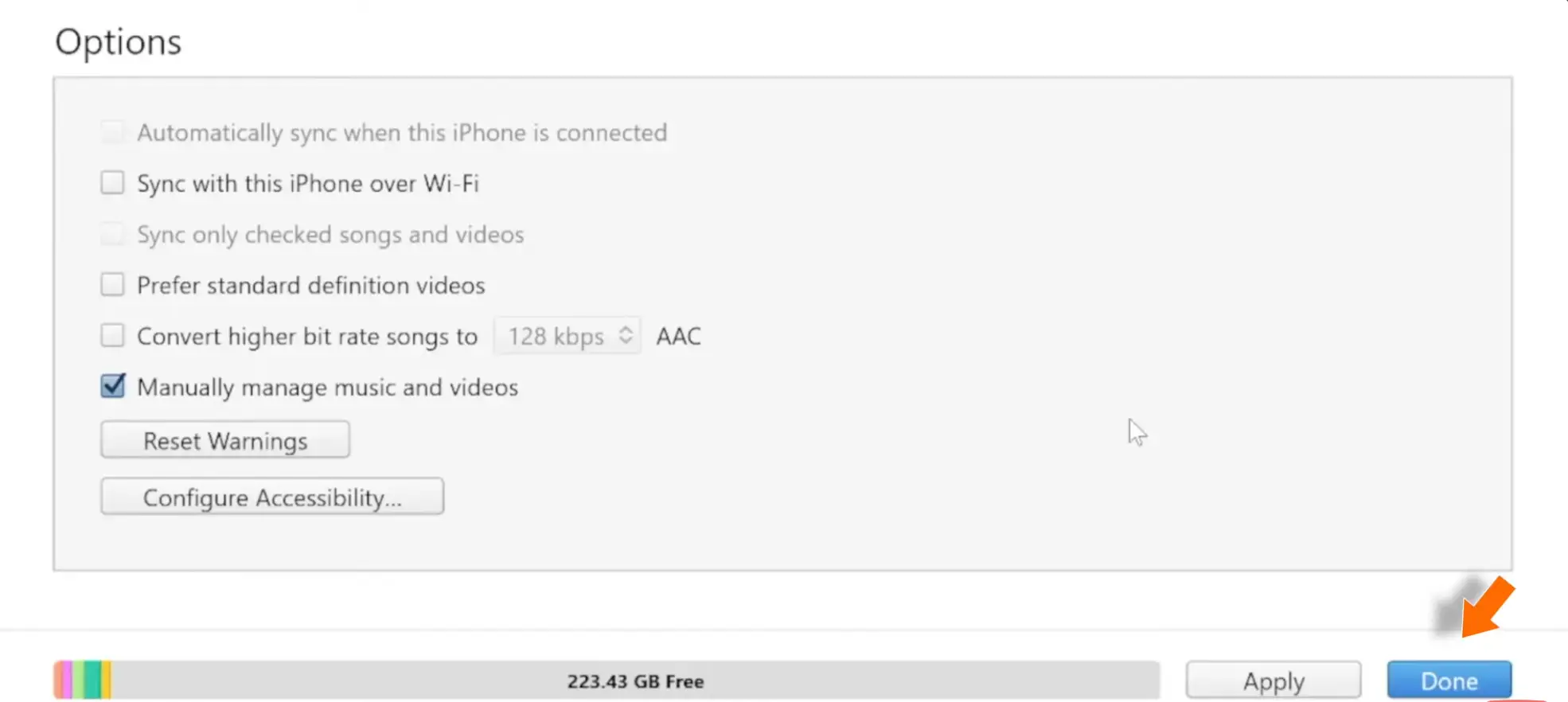 Cochez la case Manually Manage Music and Videos